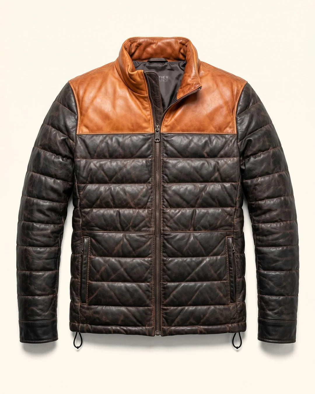 Brown and black quilted jacket on a light beige background