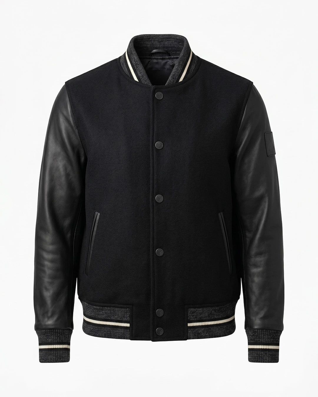 Black varsity jacket with leather sleeves on a white background