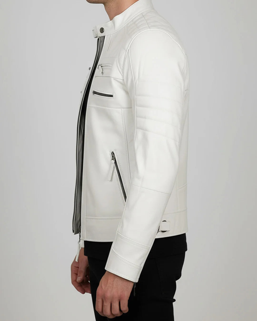 White leather jacket worn by a person on a light gray background