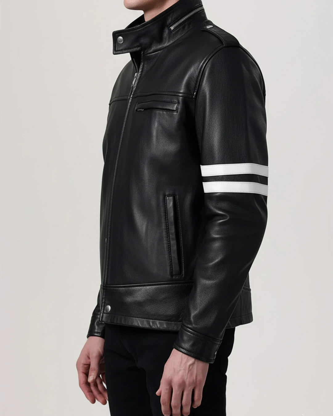 Black leather jacket with white stripes on sleeves against a light gray background
