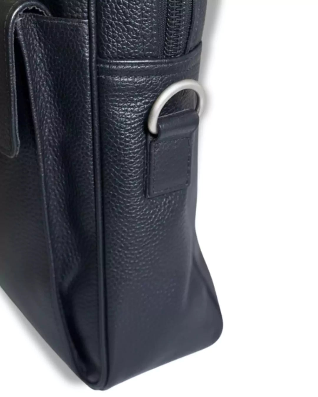 Close-up of a black leather bag with a strap on a white background