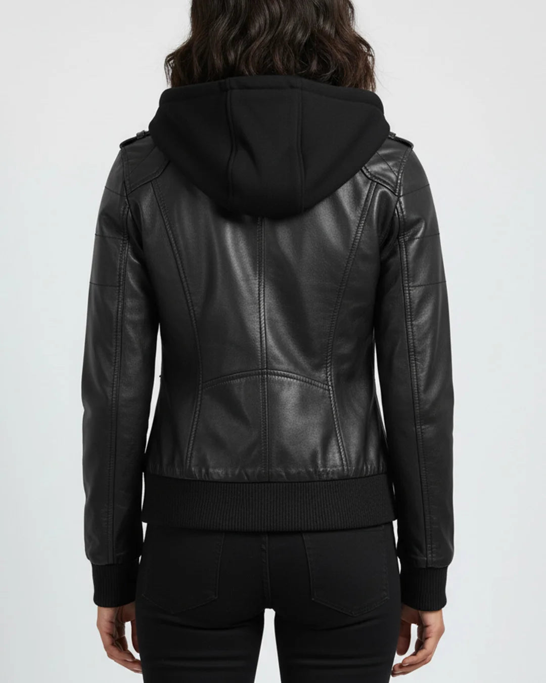 Black leather jacket with hood worn by a person on a white background